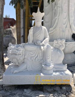 Tượng Tượng Địa Tạng Bồ Tát màu trắng cưỡi Linh Khuyến đá nguyên khối ngồi trên Linh Khuyển.