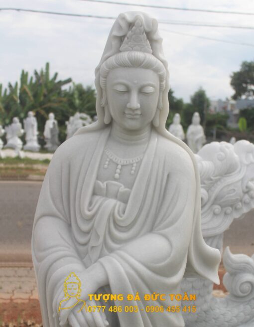 Phật Quan Âm đứng dài sen đá