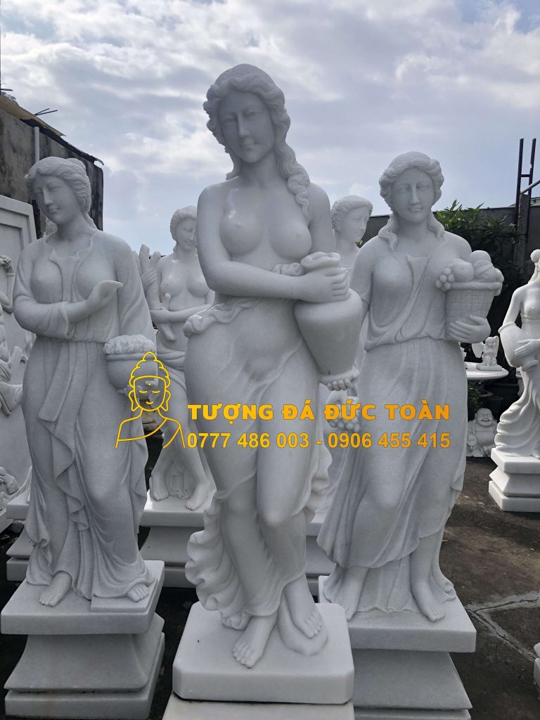 Tượng cô gái đổ nước 
