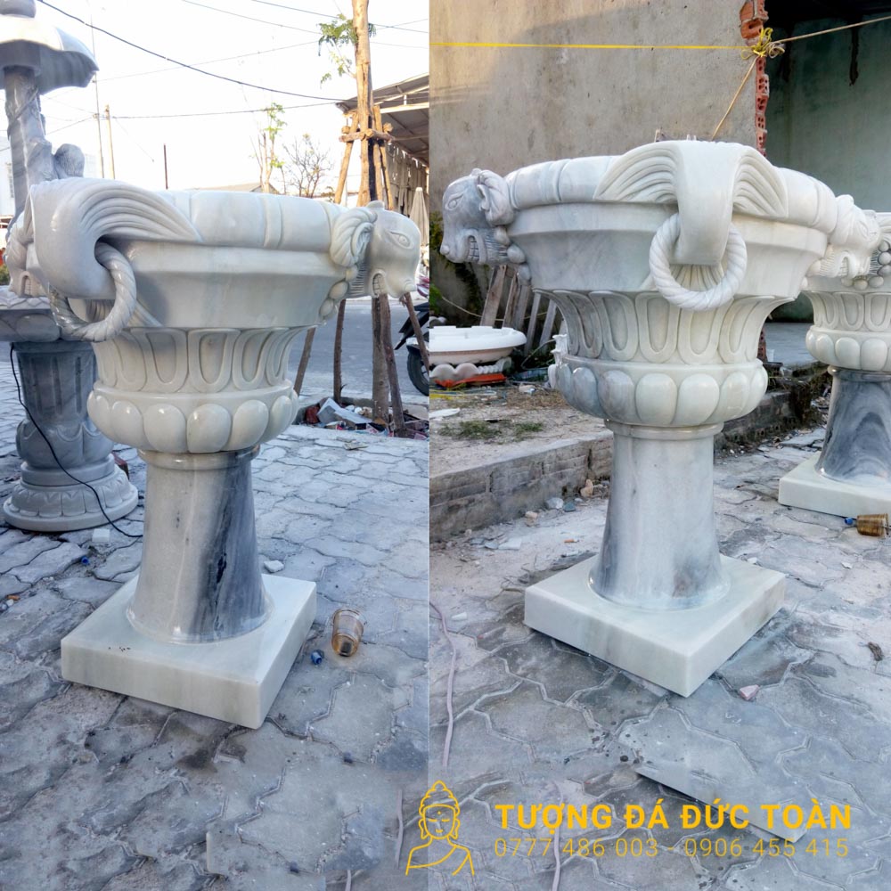 Mặt chính chậu hoa đá trắng trên chân đế vuông
