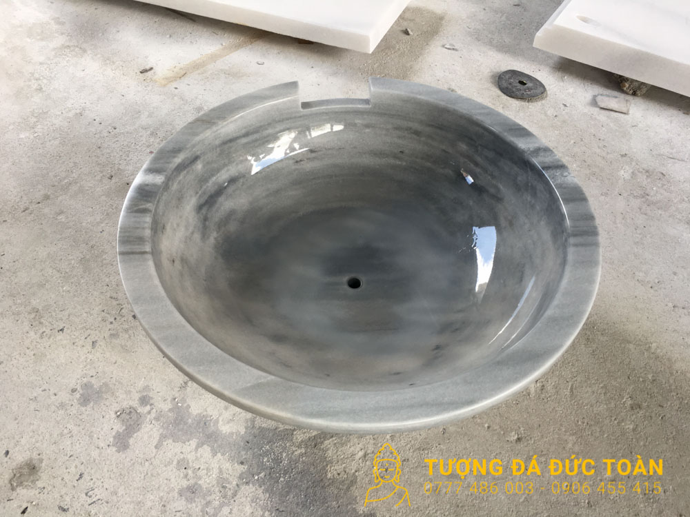 Chi tiết lòng lavabo đá xám tròn bóng nguyên khối