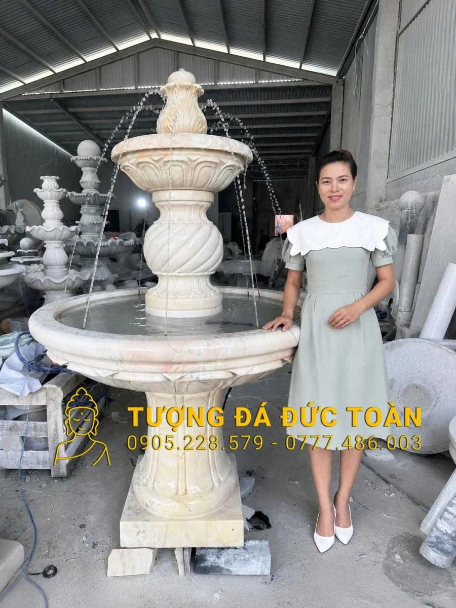 ĐÀI PHUN NƯỚC ĐÁ CẨM THẠCH VÀNG NGUYÊN KHỐI CAO 2M